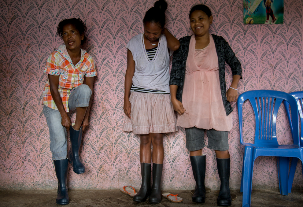 These women from Ermera are delight with their new boots, which will enable them to keep their feet dry in the wet season